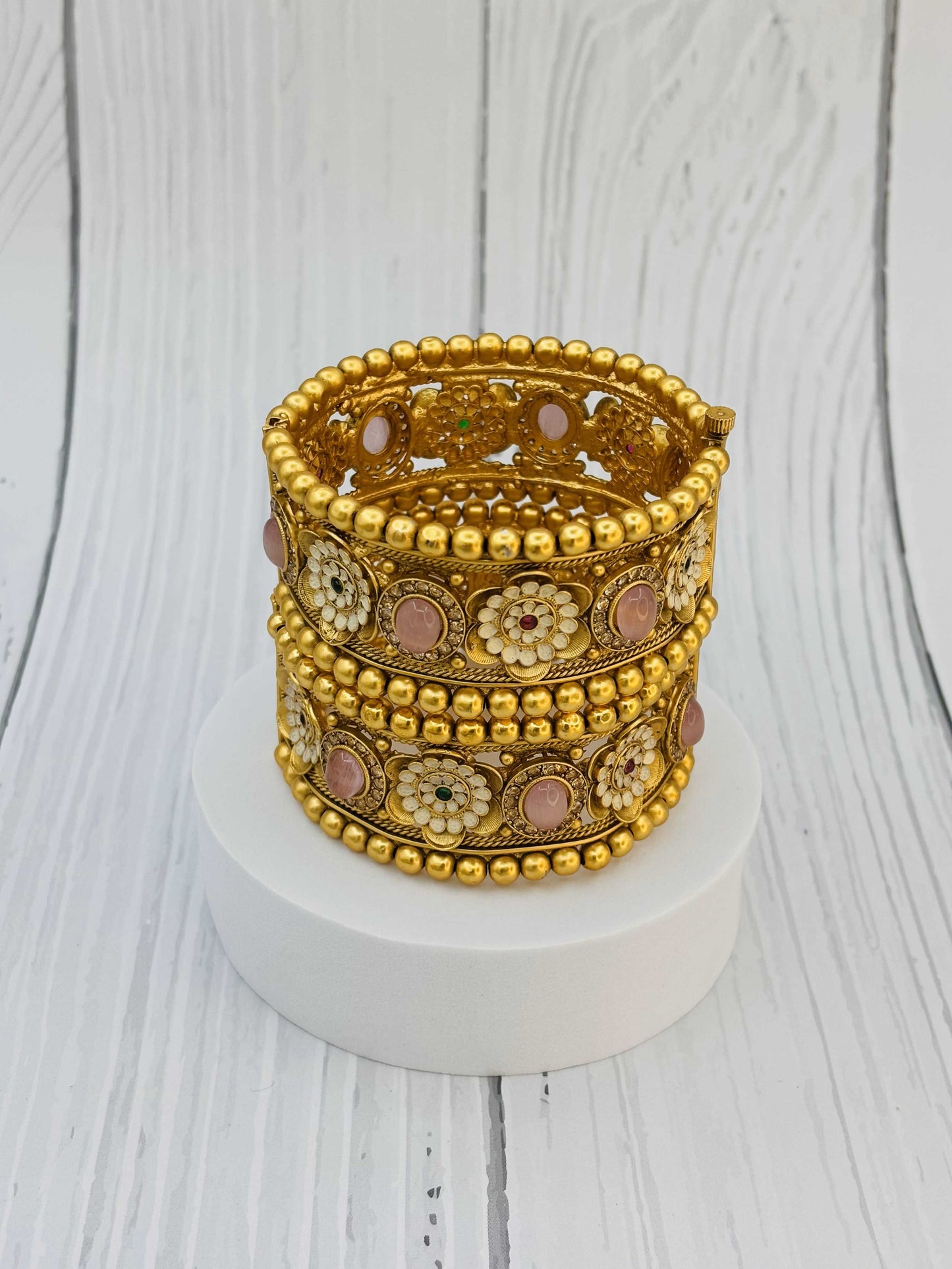 Antique Gold Kundan Bangles with Floral and Pink Stone Detailing