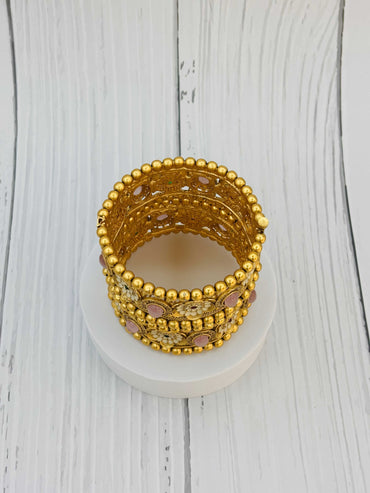 Antique Gold Kundan Bangles with Floral and Pink Stone Detailing