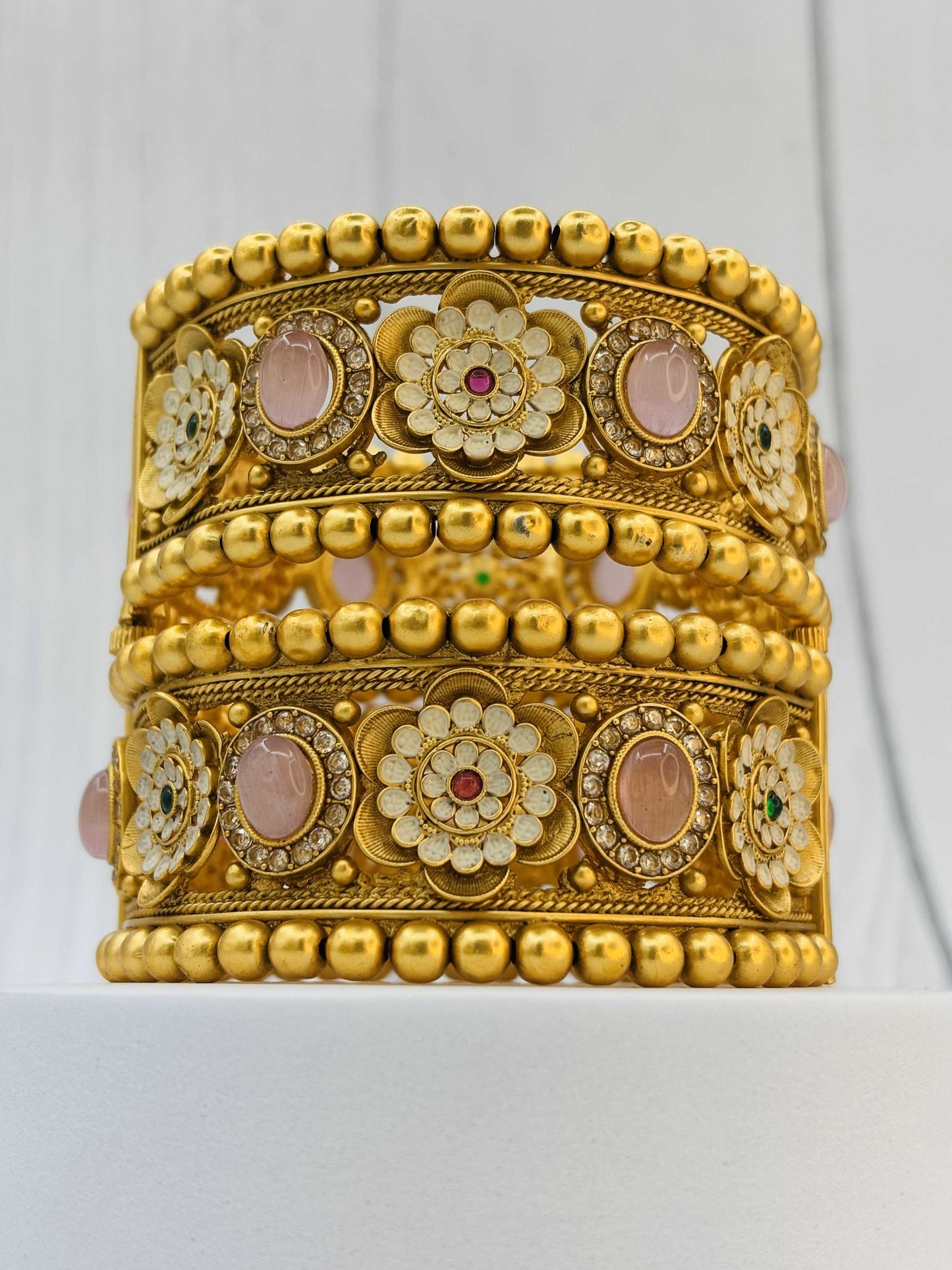 Antique Gold Kundan Bangles with Floral and Pink Stone Detailing