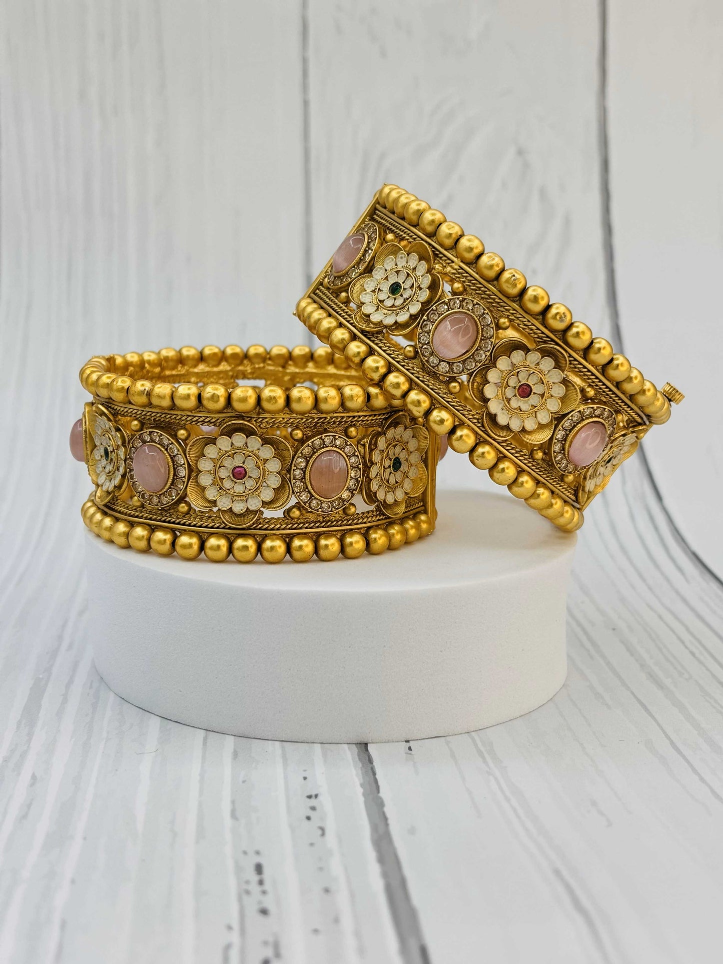 Antique Gold Kundan Bangles with Floral and Pink Stone Detailing