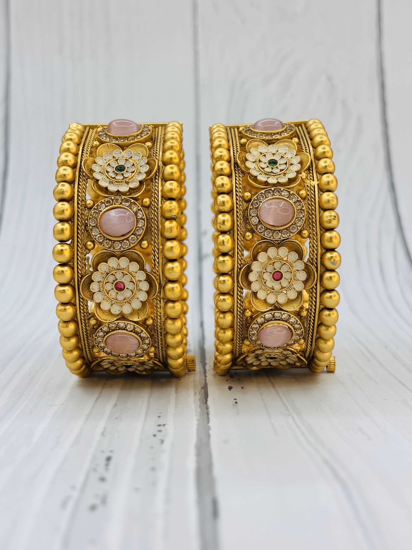 Antique Gold Kundan Bangles with Floral and Pink Stone Detailing