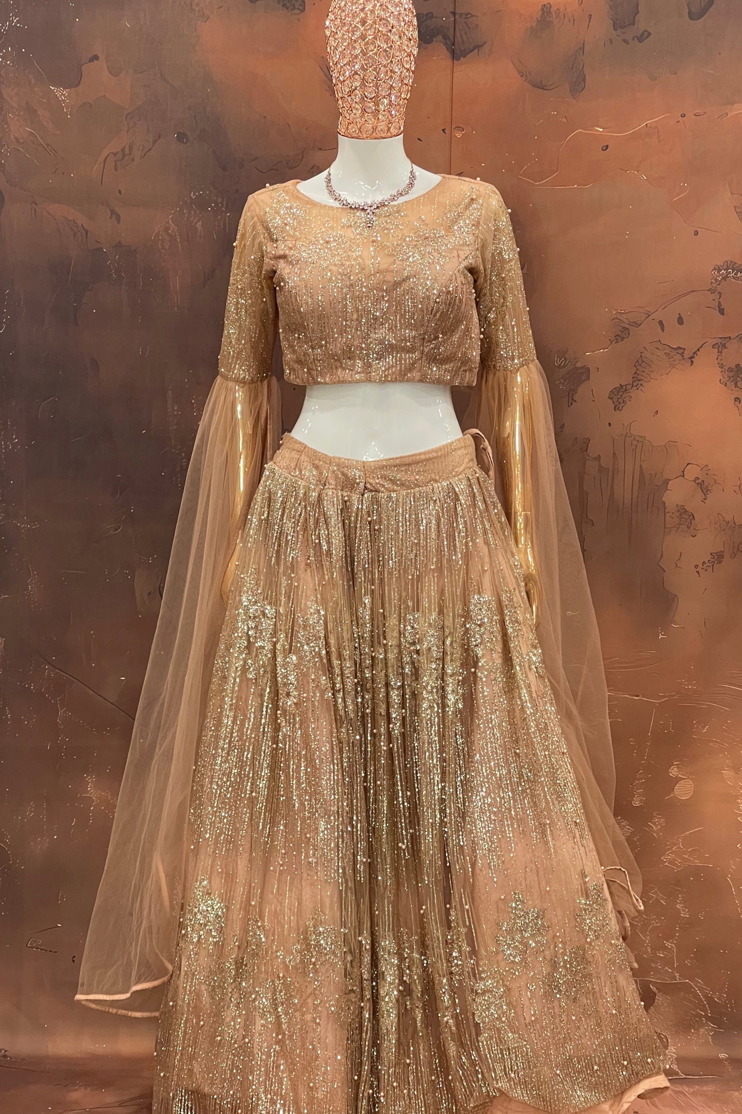 Golden Glow – Peach Net Embellished Lehenga Set