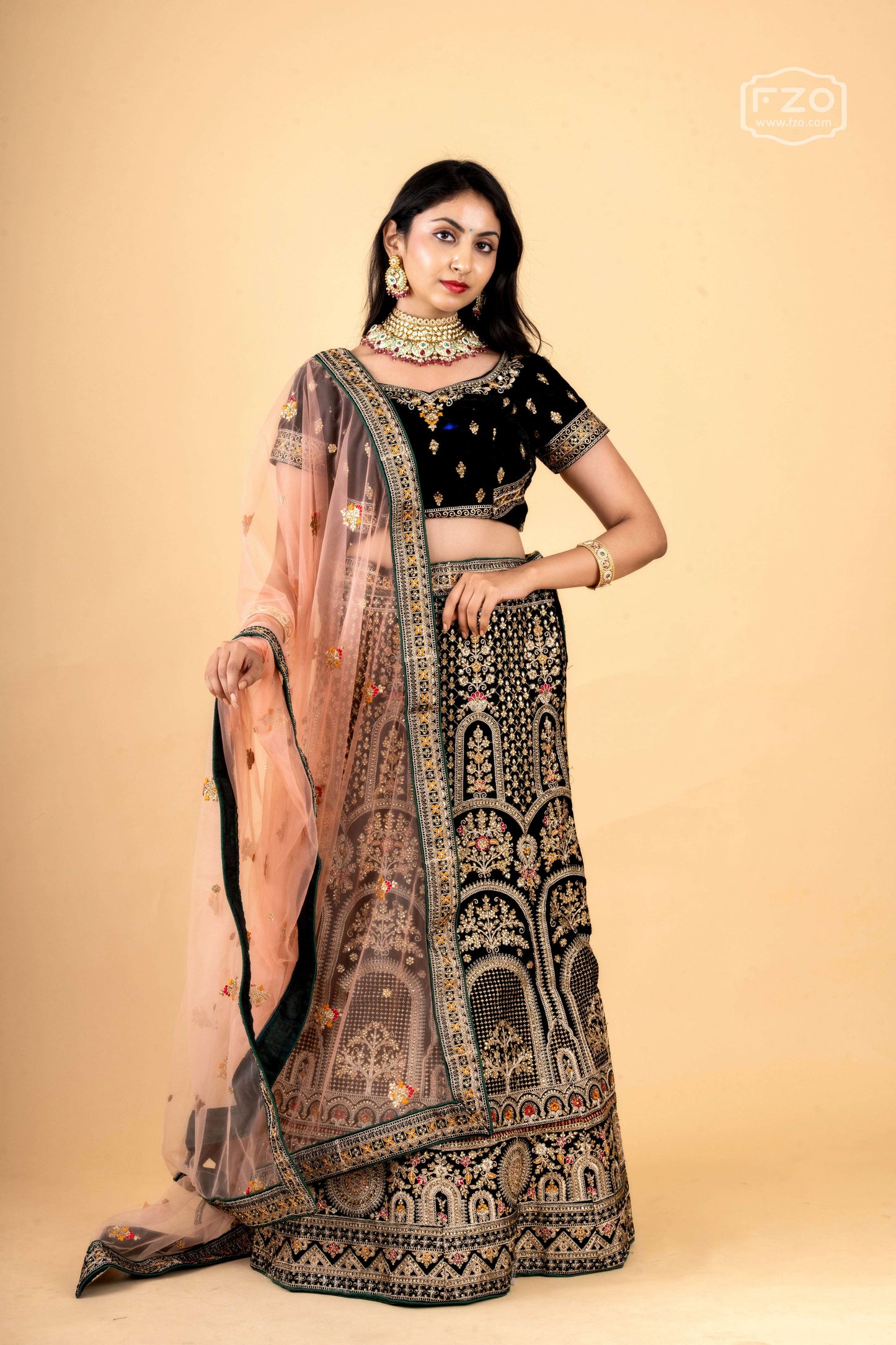 Dark Green Velvet Embroidered Lehenga with Blush Net Dupatta