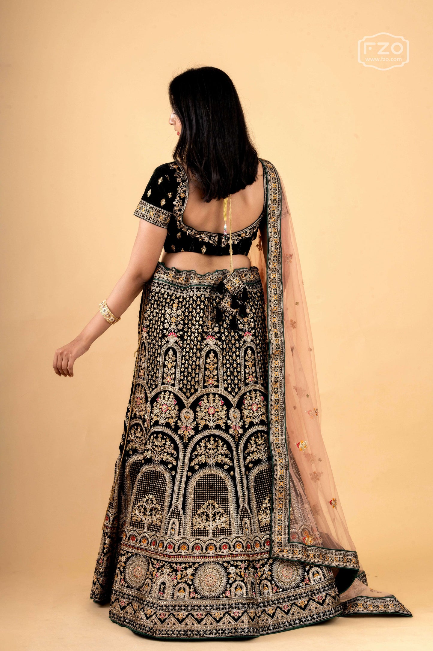 Dark Green Velvet Embroidered Lehenga with Blush Net Dupatta
