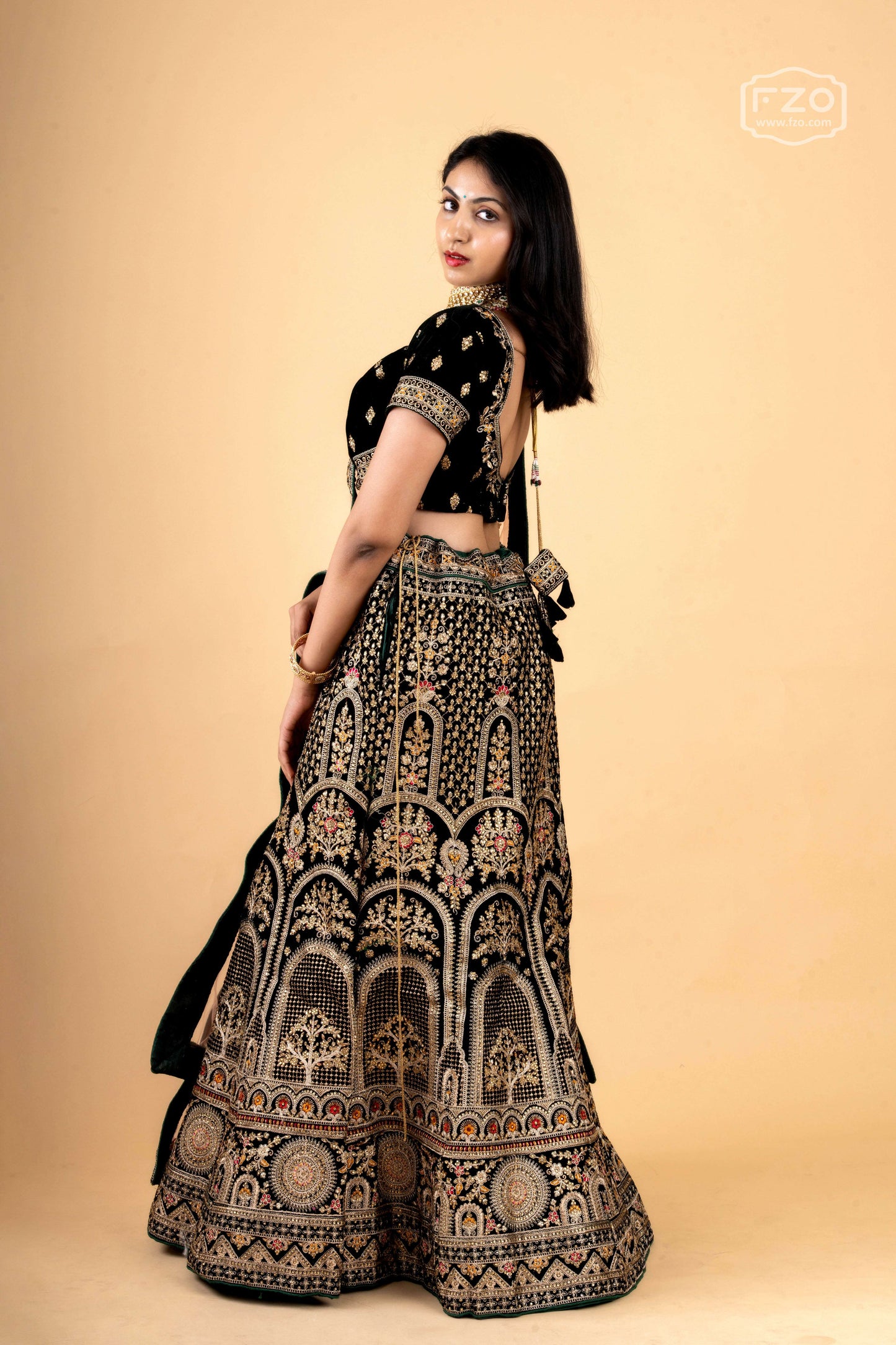 Dark Green Velvet Embroidered Lehenga with Blush Net Dupatta
