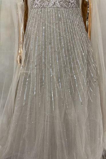 Beige Embellished Gown with Sheer Cape Sleeves