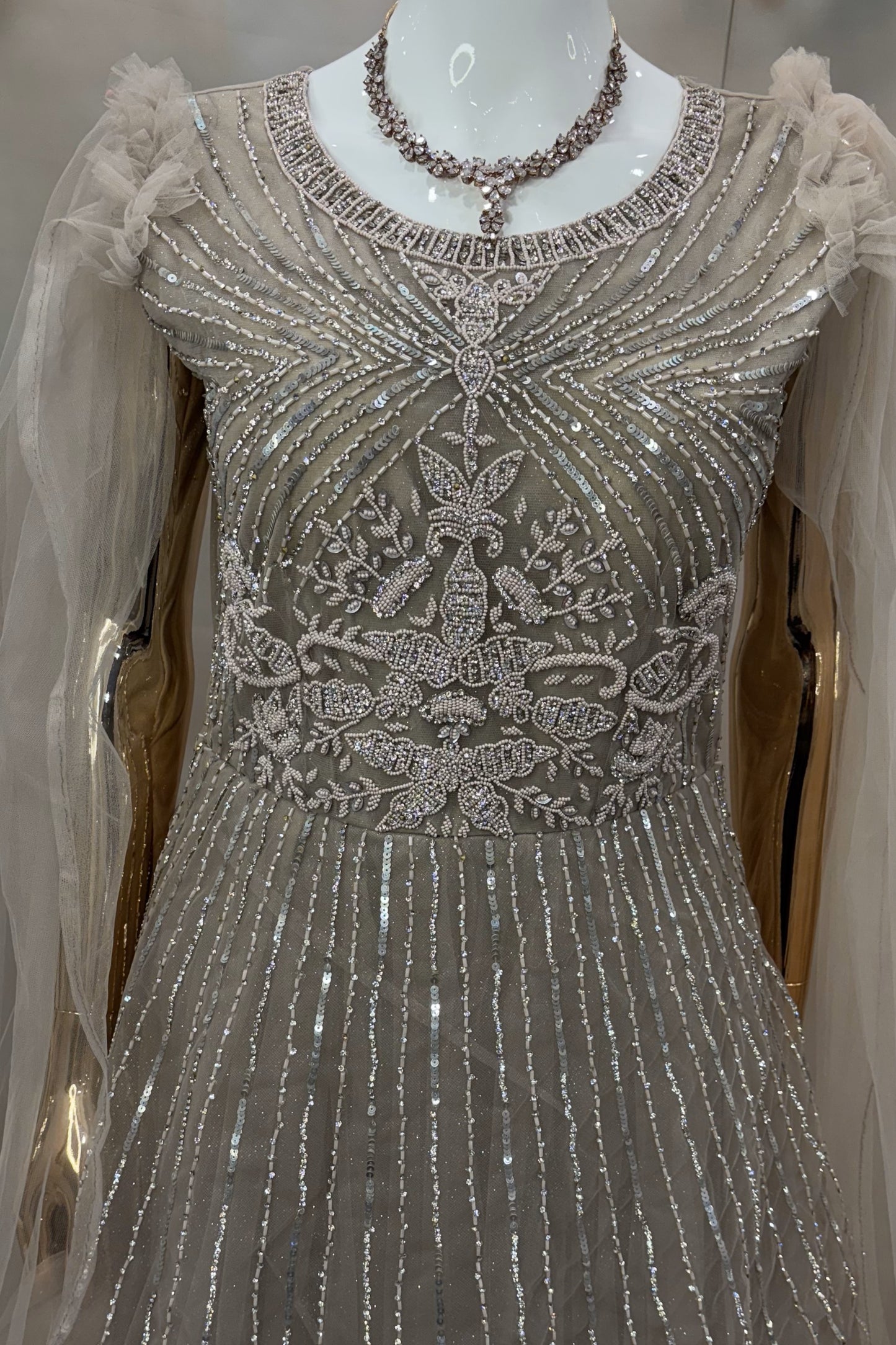 Beige Embellished Gown with Sheer Cape Sleeves