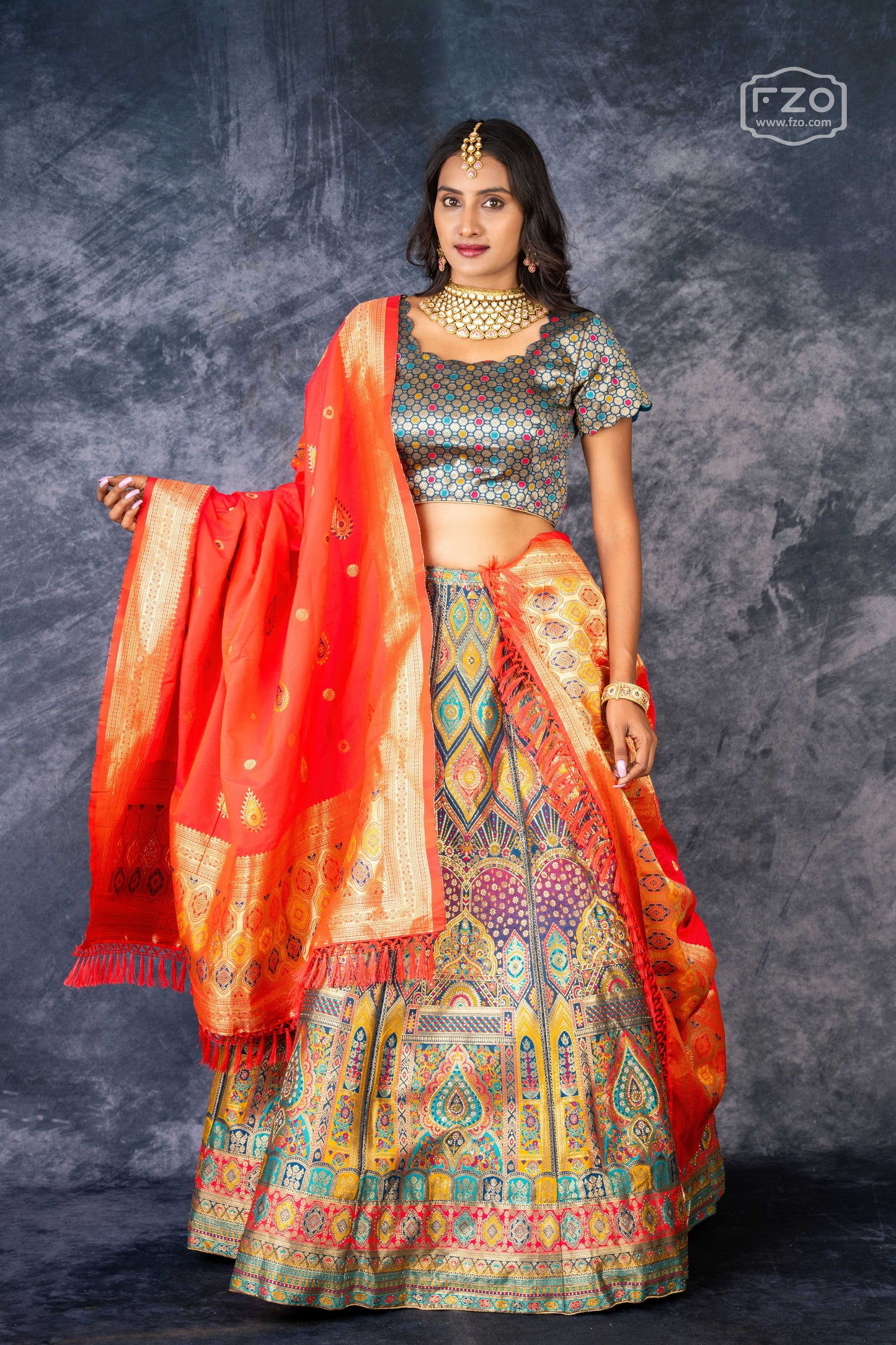 Vibrant Mosaic – Multi-Color Printed Lehenga with Orange Dupatta Set