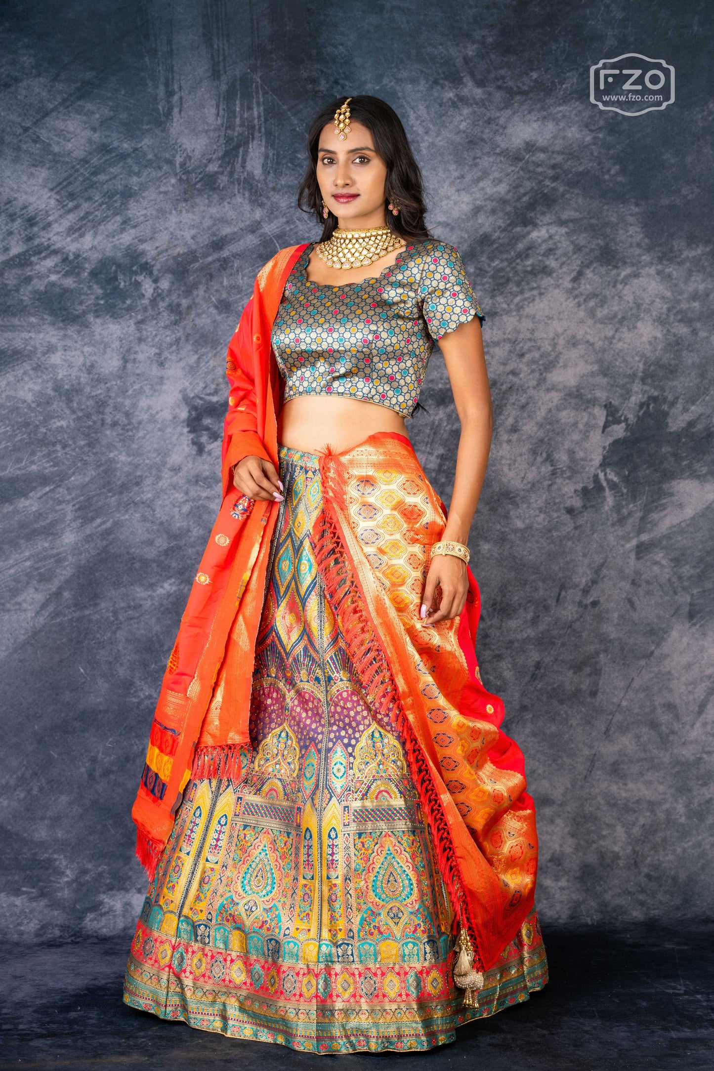 Vibrant Mosaic – Multi-Color Printed Lehenga with Orange Dupatta Set