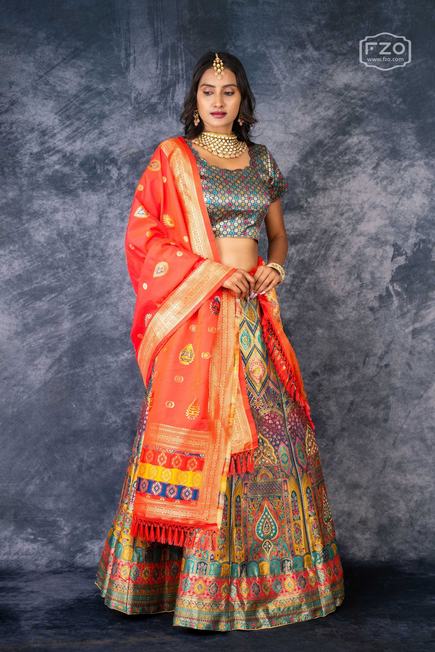 Vibrant Mosaic – Multi-Color Printed Lehenga with Orange Dupatta Set