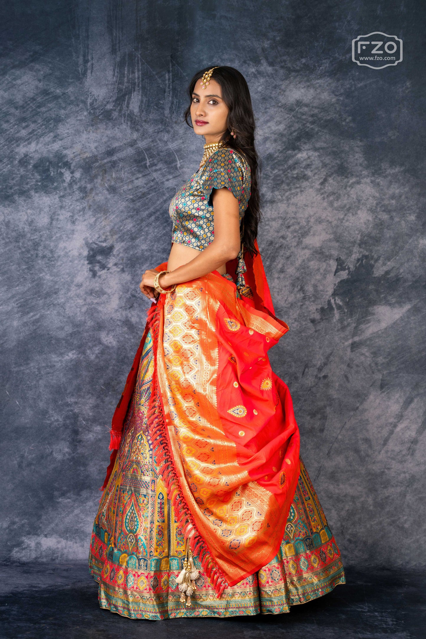 Vibrant Mosaic – Multi-Color Printed Lehenga with Orange Dupatta Set