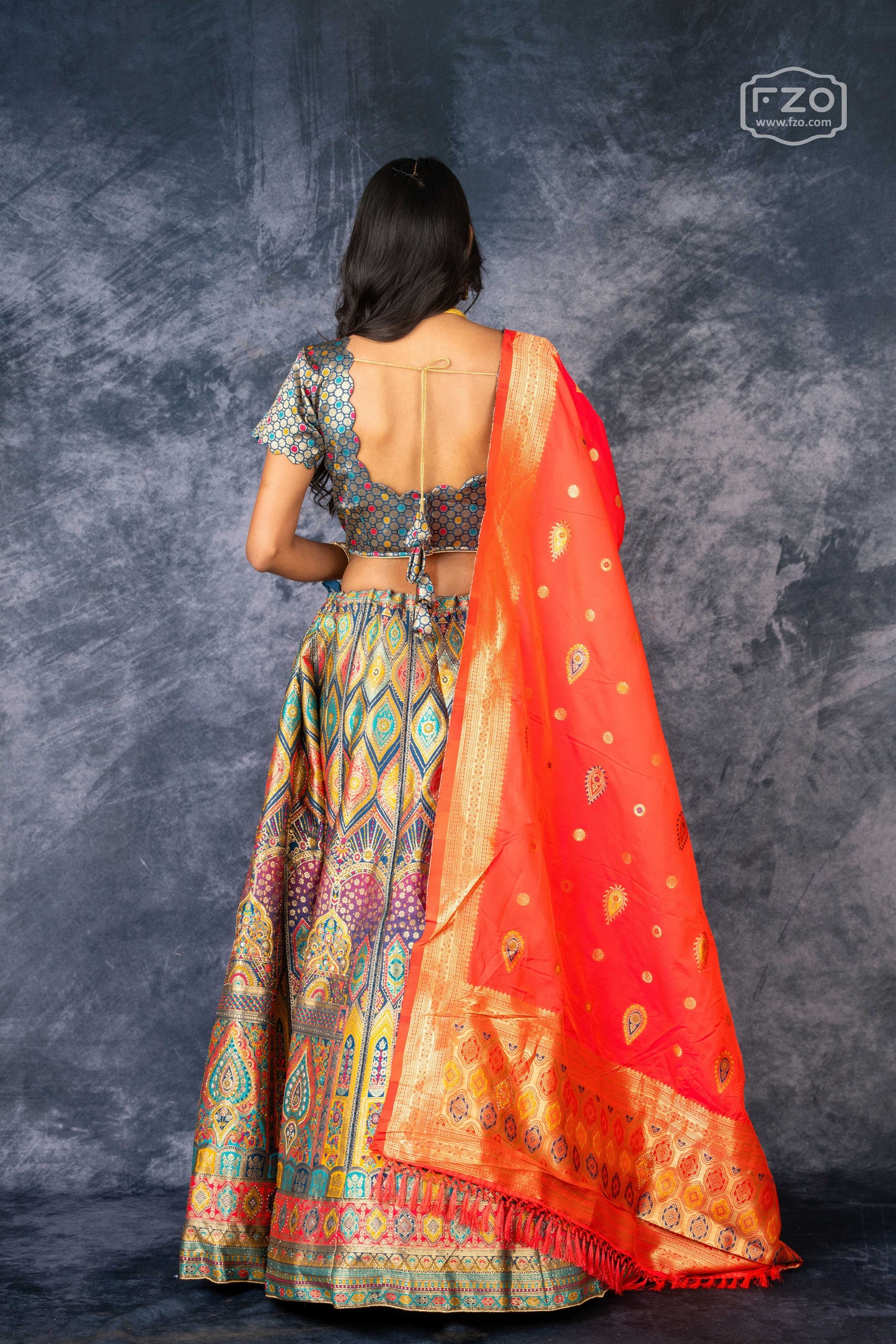 Vibrant Mosaic – Multi-Color Printed Lehenga with Orange Dupatta Set