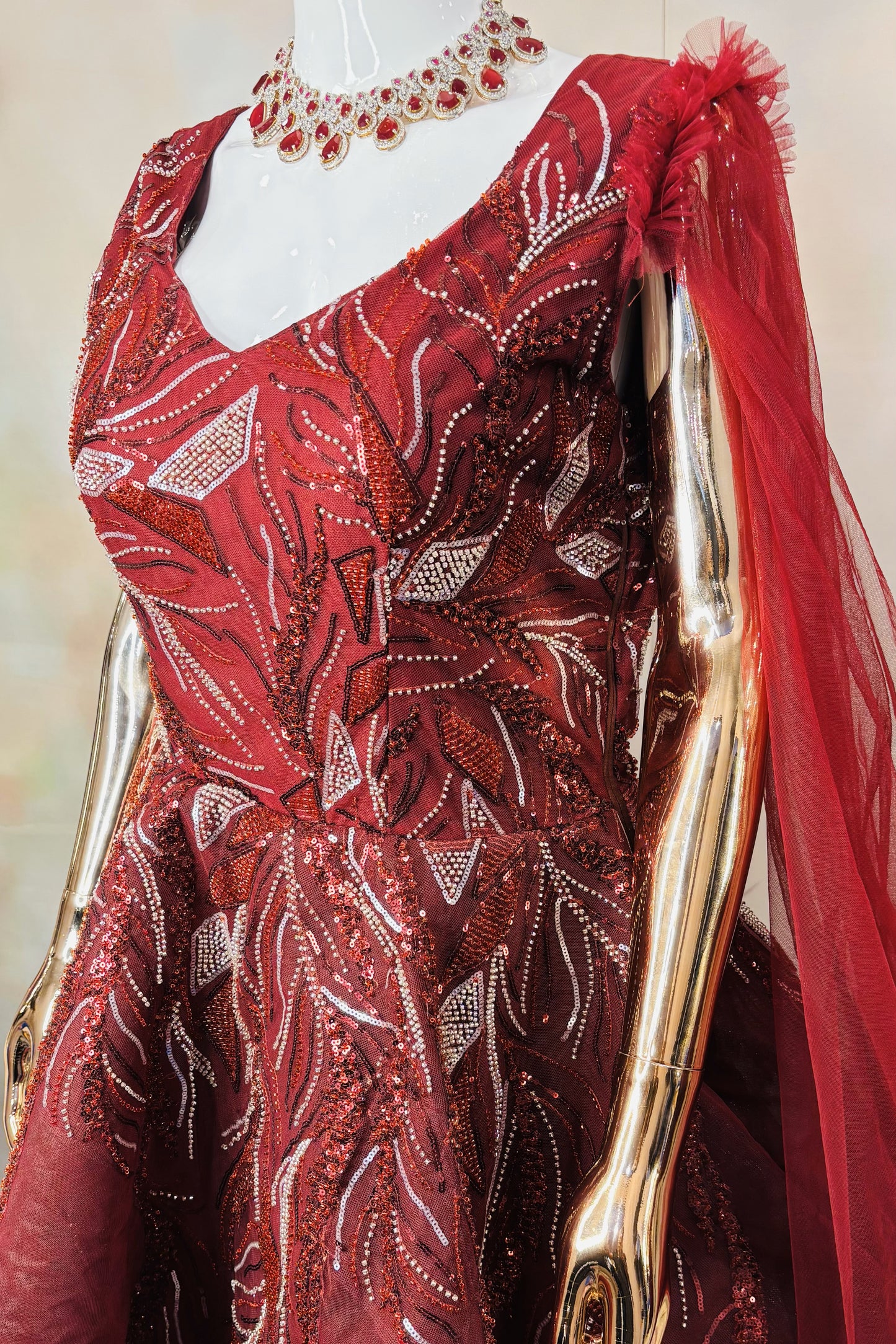 Deep Maroon Sequin-Embroidered Gown with Dramatic Flair