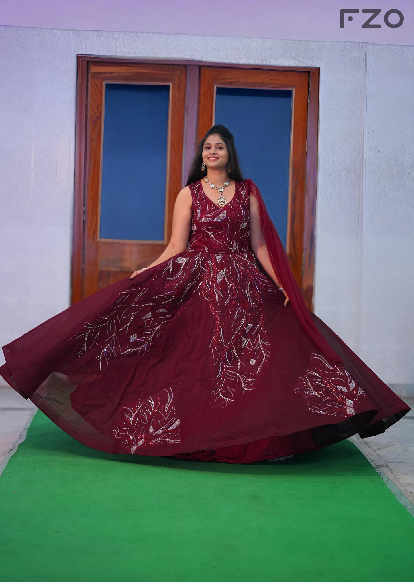Deep Maroon Sequin-Embroidered Gown with Dramatic Flair