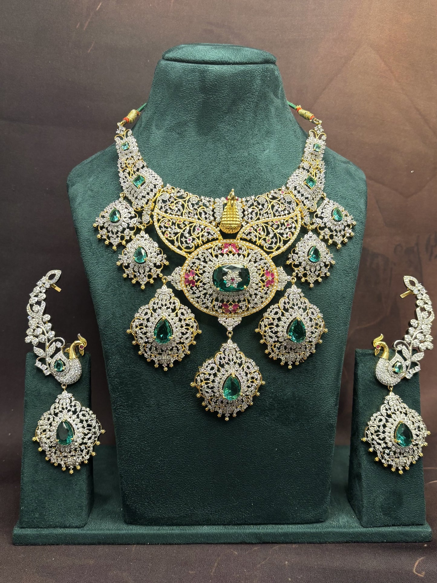 Royal Peacock Charm Emerald Necklace Set: Rent in Jubilee Hills!