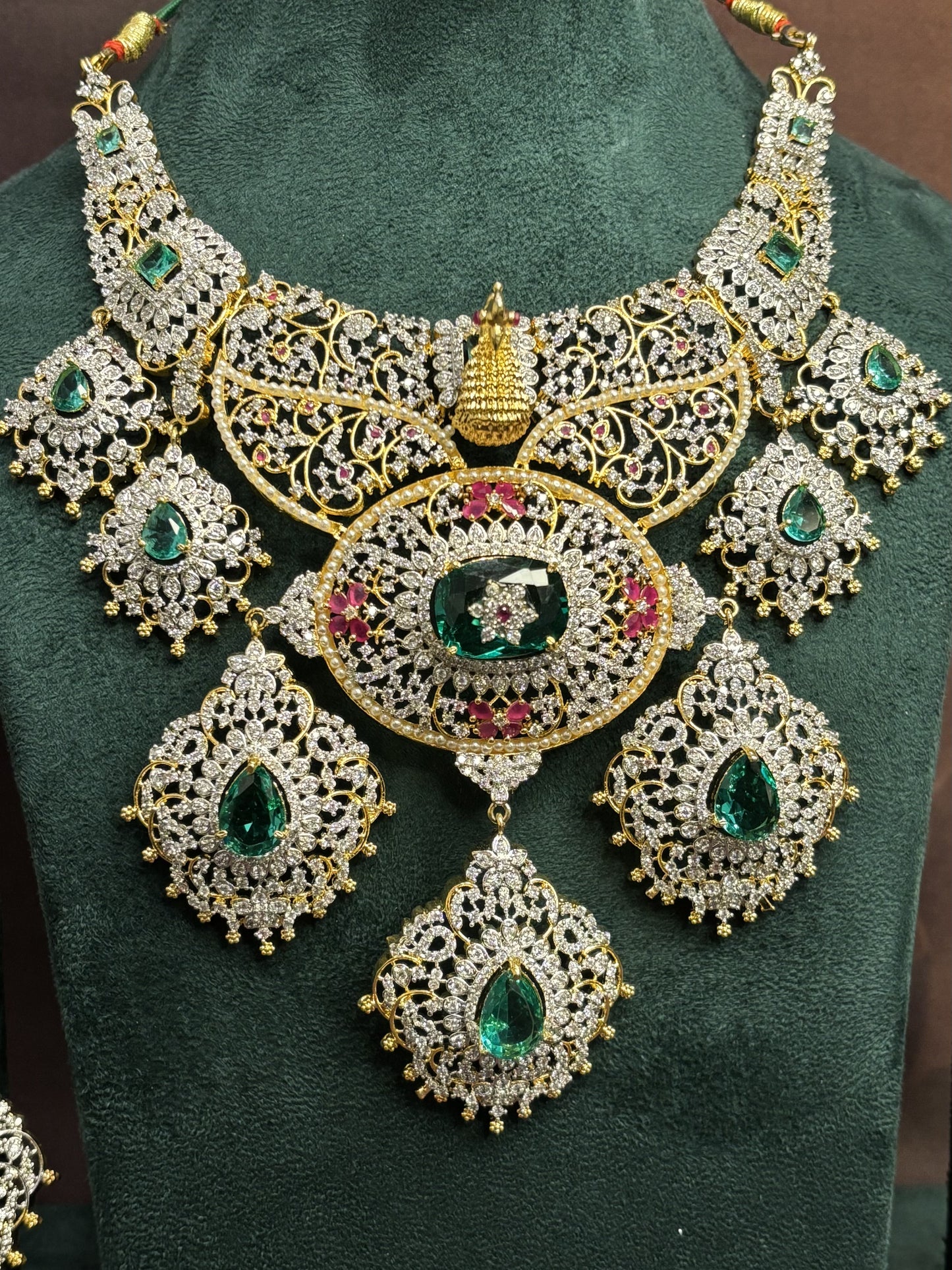 Royal Peacock Charm Emerald Necklace Set: Rent in Jubilee Hills!