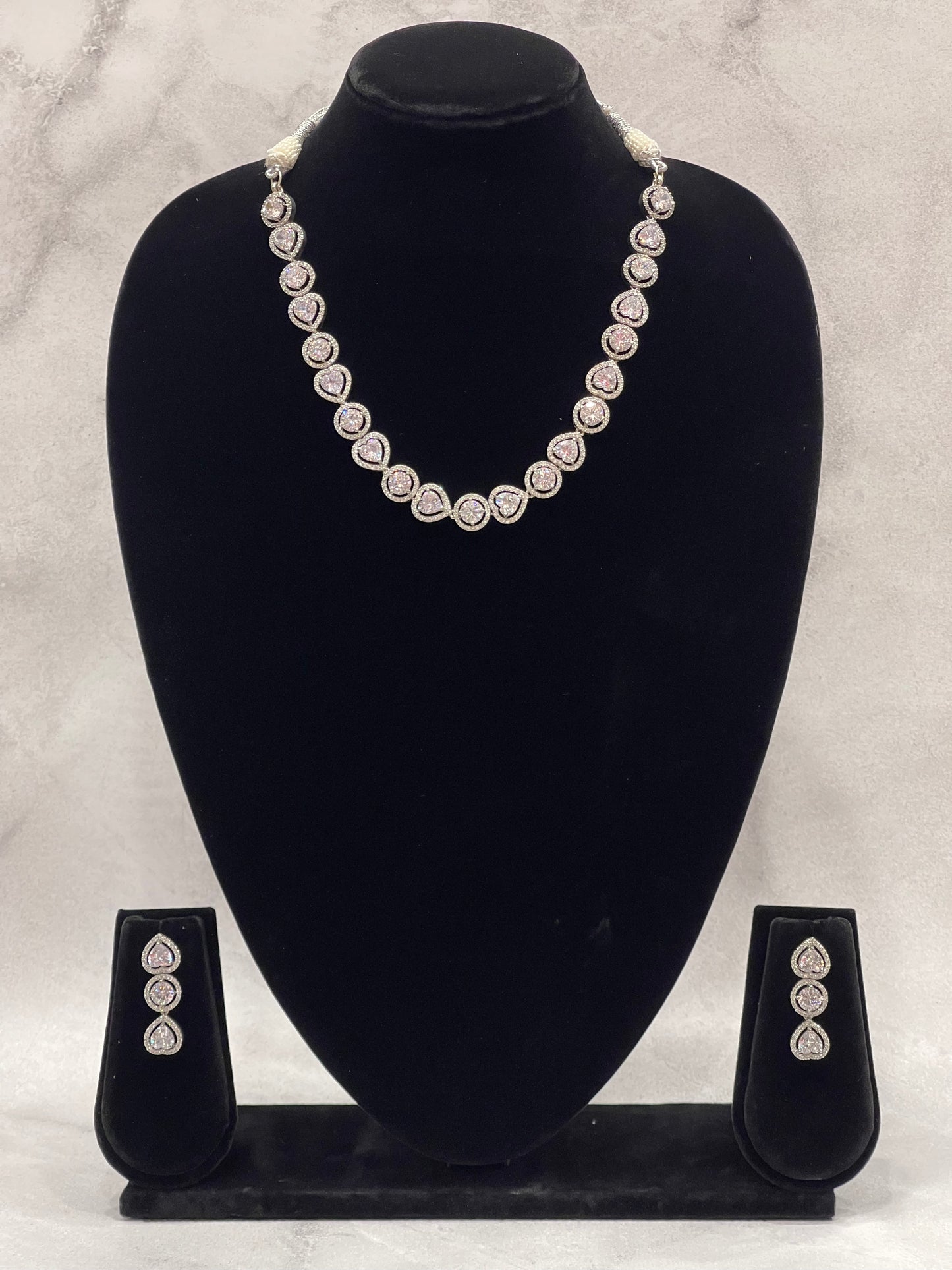 Teardrop Radiance – Diamond-Cut CZ Necklace Set in Silver Finish